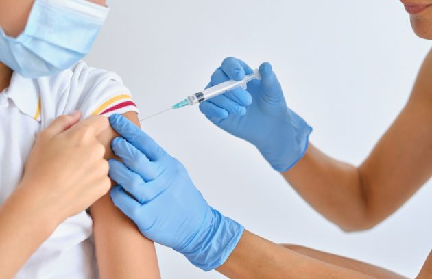 tenyearold-boy-getting-vaccinated-hospital